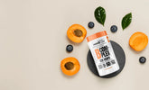 Assortiment de fruits riches en vitamine B, incluant abricots, cerises, myrtylles